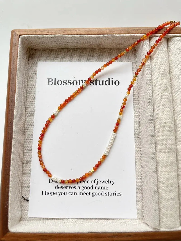 Blossom studio·S925Sterling Silver Red Agate Natural Stone Pearl Stitching Necklace｜40+5c m · Necklace40+5 https://www.xiaohongshu.com/goods-detail/6572d4c914f2c80001ded991