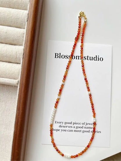Blossom studio·S925Sterling Silver Red Agate Natural Stone Pearl Stitching Necklace｜40+5c m · Necklace40+5 https://www.xiaohongshu.com/goods-detail/6572d4c914f2c80001ded991