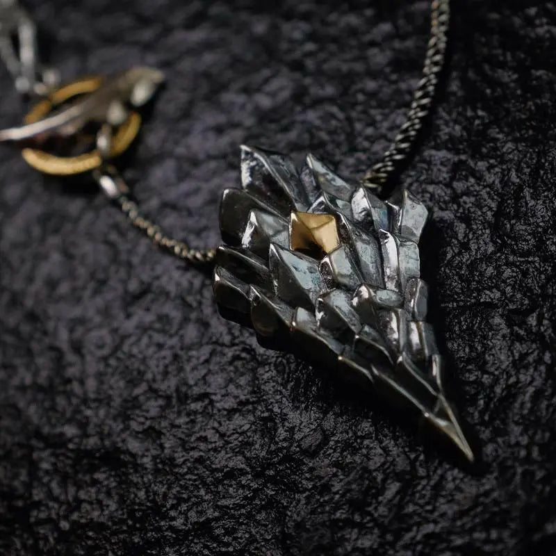 Sterling silver necklace dragon scale pendantSilver Dragon Pendant- A Blend of Style and Elegance
This stunning Silver Dragon Pendant showcases the robust dragon scale design, crafted with utmost precision usinBuddha EnergyBuddha&EnergySterling silver necklace dragon scale pendant