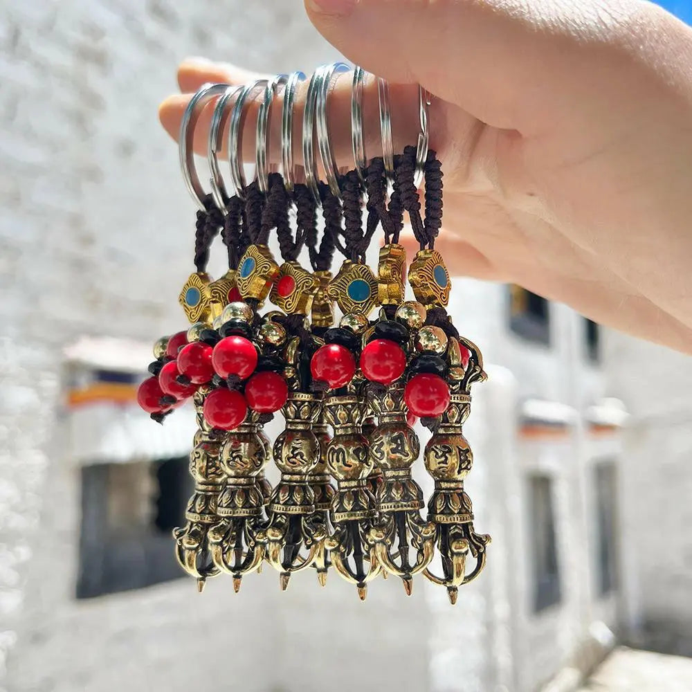 Six-word mantra key chainFive-strand vara key chainThis vara Doree key chain is a characteristic handicraft of Bark hor Street in TibetGifts, small and exquisite, with a six-character mantraBuddha EnergyBuddha&Energy-character True Words Keychain Key Hanging Jewelry